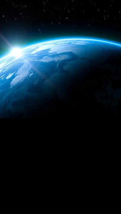 Stunning view of Earth from space with glowing aurora lights and stars