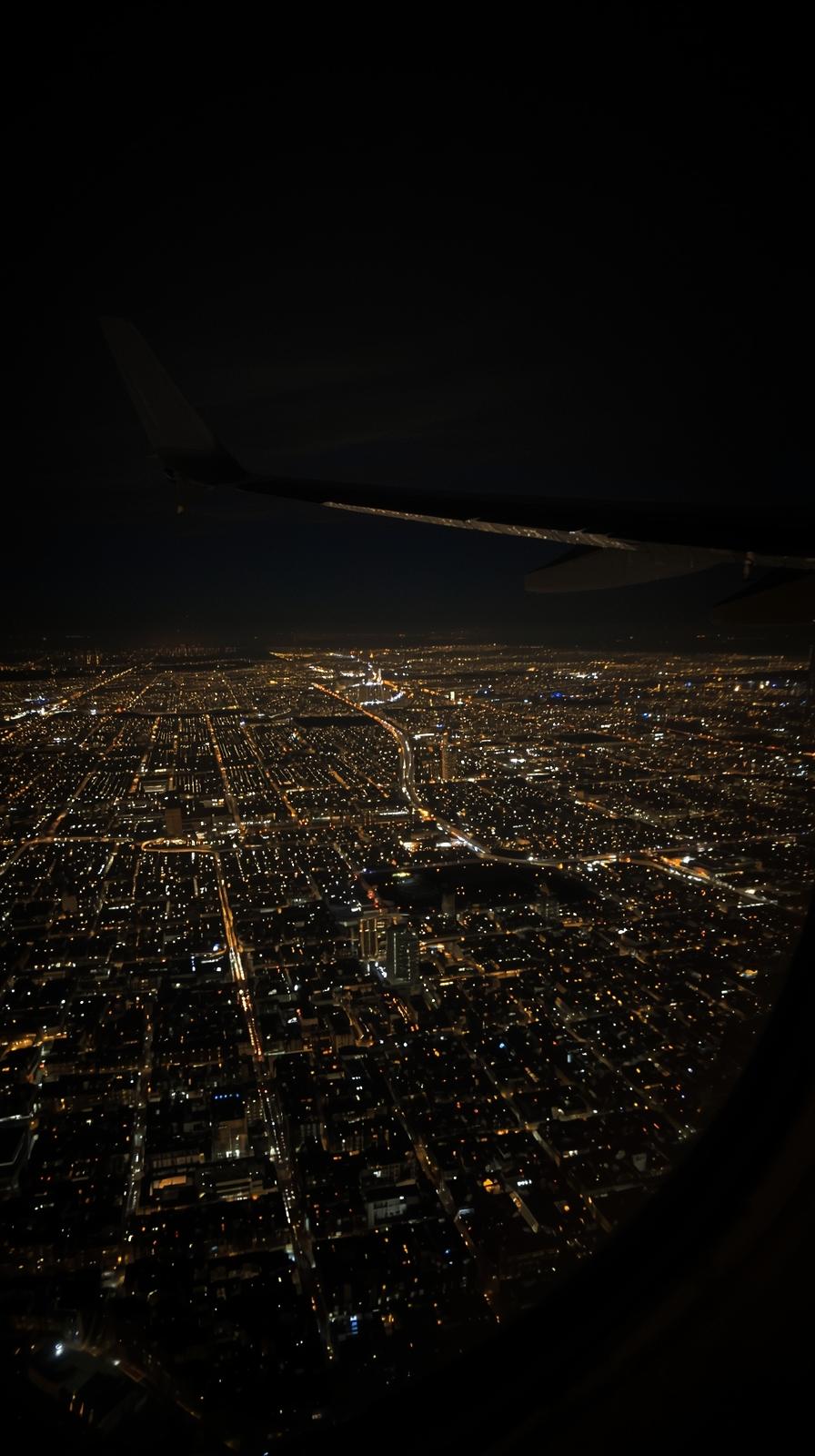 City From Airplane Window View