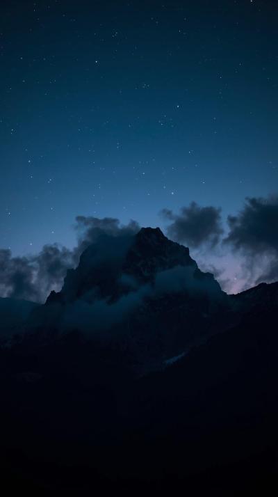 Dark Moody Mountain Silhouette At Dusk With Mist A