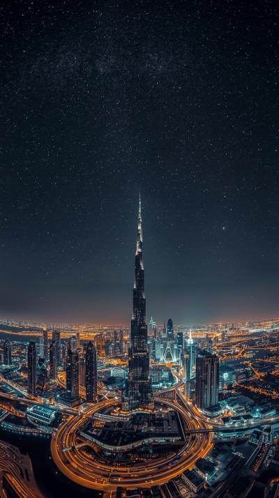 Dubai Skyline With Burj Khalifa Against A Starry N