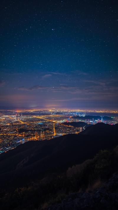 Night View Of City Lights From Mountain Top