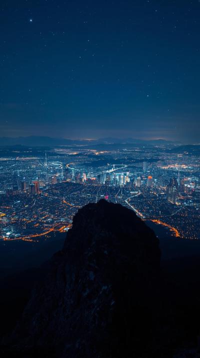 Night View Of City Lights From Mountain Top